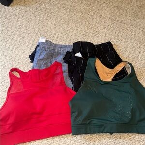 Lot of 4 - Red Zyia bra, Green Buffbunny bra, 2 pair of linen blend shorts